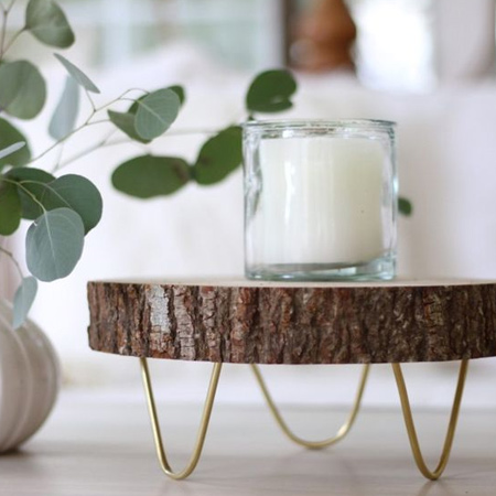 With wood slice and wire you can make your own decorative trivets or stands for a variety of items - and they look wonderful when used as decor pieces.