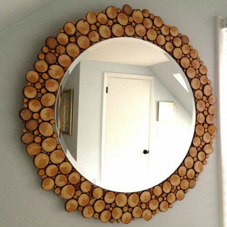mount wood slices onto a backing board as a unique surround for a mirror.