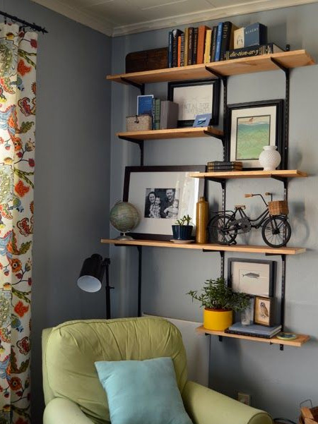 Do away with melamine shelves and add personality with wood or reclaimed timber shelves. You can even cut down pallet wood to make your own shelves.