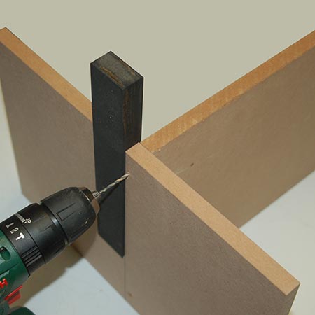 When you are new to DIY, or are installing shelves in a project, it's easy to drill pilot holes in the wrong place. We show you how to make a nifty jig that makes finding edges easy.