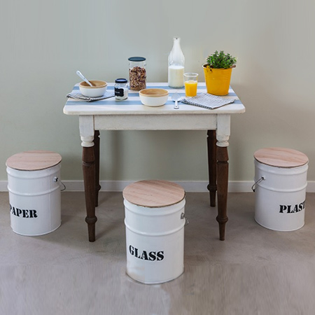 Upcycle empty paint cans into dual purpose stools that can also be used as recycling bins.