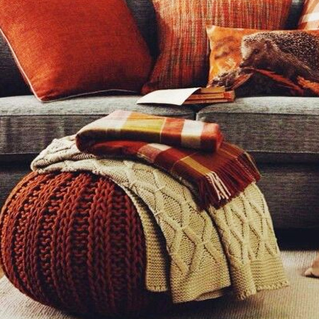 This knitted pouffe is so easy to make, you could make more than one! A knitted pouffe adds warmth and texture to the winter home and is great for lounging in front of the fire.
