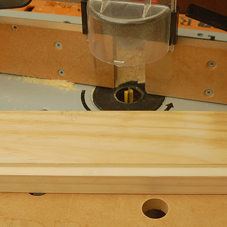 2. Use a router and straight bit to cut a rebate in the top sections for mounting the glass. The depth will be determined by the thickness of the safety glass you fit - we cut a 5 x 5mm rebate on the inside edge of both top sections.
