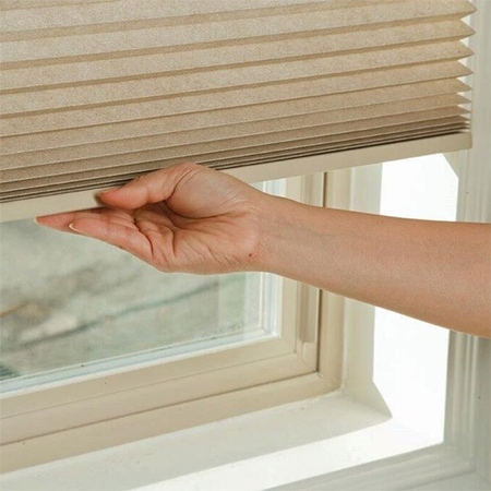 Honeycomb blinds from Finishing Touches offer an energy efficient way to warm up a home