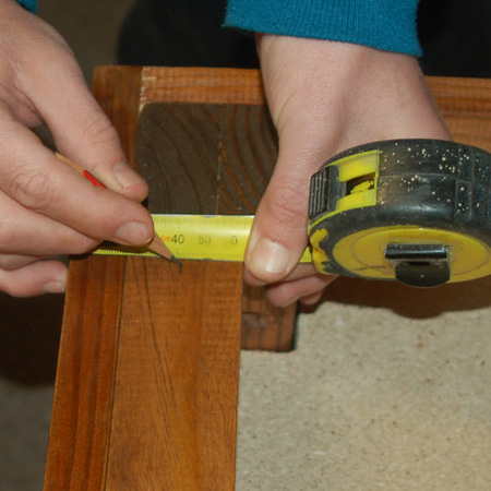 11. Measure and mark the centre of the rail along the width and length.
