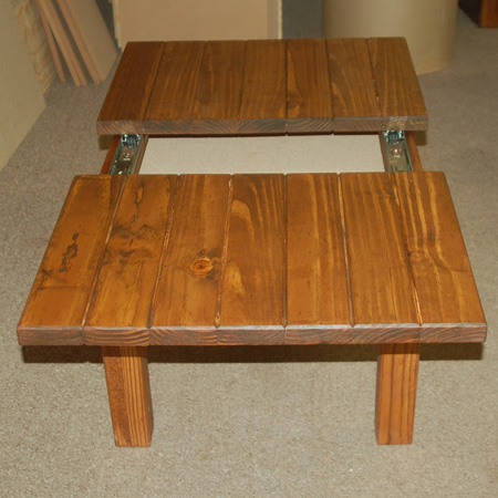 BELOW: Table with sections open to reveal storage compartment.