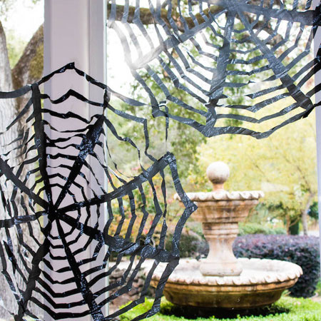HOME-DZINE | Halloween Crafts - Make your own fun refuse bag spiderwebs. Found on fast forward fun, these spiderwebs will add a fun elements to windows and your Halloween decorations.