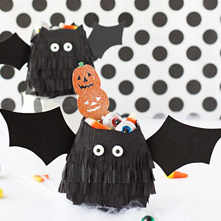 HOME-DZINE | Halloween Crafts - Make your own bat treat packs for handing out to the kids for Halloween. All you need is some black crepe paper and card, and craft glue or a hot glue gun.