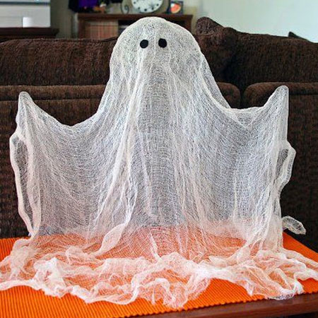HOME-DZINE | Halloween Crafts - These floating ghosts are easy to make using cheesecloth and items you probably already have in the house. 