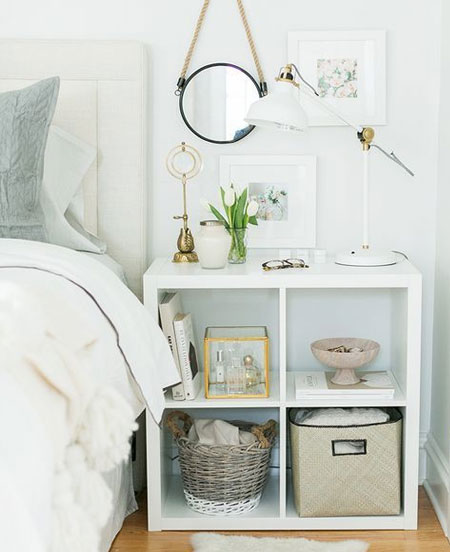 HOME-DZINE | Bedroom Ideas - If you opt for a bedside table with open shelves, use baskets and pretty boxes to contain the clutter. Too much stuff in a small or medium bedroom can quickly make the room feel clutter and messy.