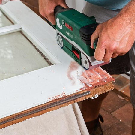 6. Once dry, sand the repaired area smooth with an orbital sander.