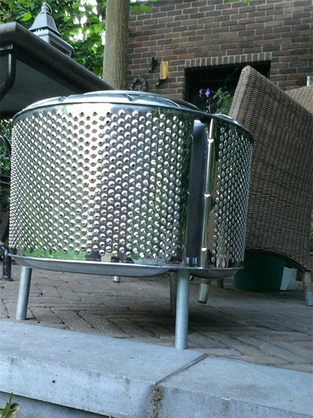 This simple design from Instructables is super easy to make, and all you need is a stainless steel drum taken from a broken washing machine