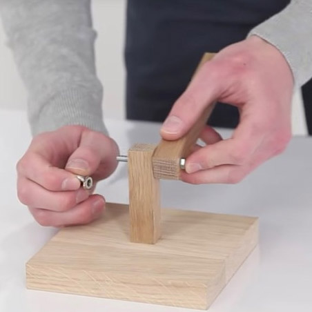 Use a bolt and wingnut to secure a long section of wood