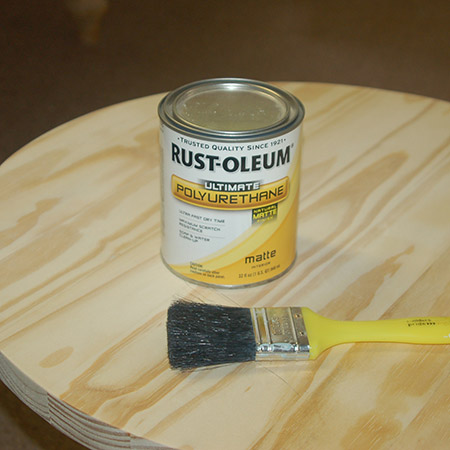 You have several options for finishing the occasional table. I'm applying Rust-Oleum Ultimate Polyurethane in natural matte. I don't want the table to go yellow after sealing, and I also want the table to look at natural as possible. 