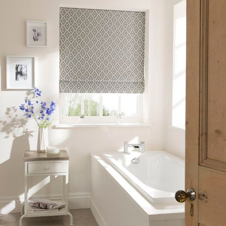 The experts at Finishing Touches can help you choose the perfect window treatment for your bathroom.