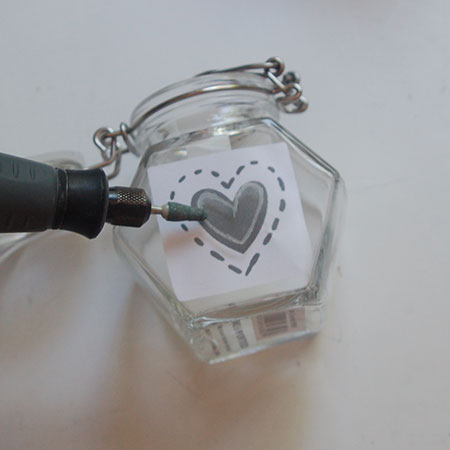 HOME-DZINE | Dremel Projects - The easiest way to transfer a design onto glass, especially if you are not good at drawing, is to print out a design from the Internet. The printed design is stuck onto the inside of the jar or container with sellotape. 