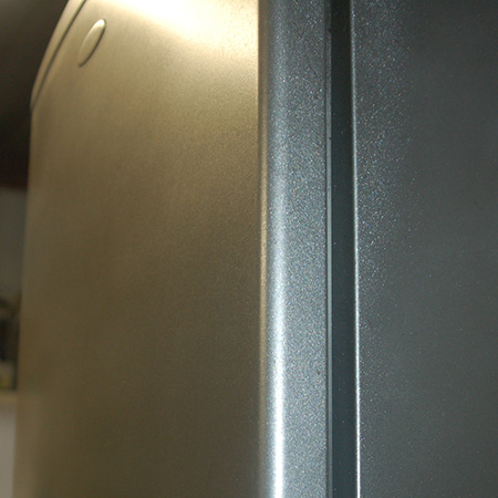 restore refrigerator with Rust-Oleum Universal spray paint in Titanium Silver