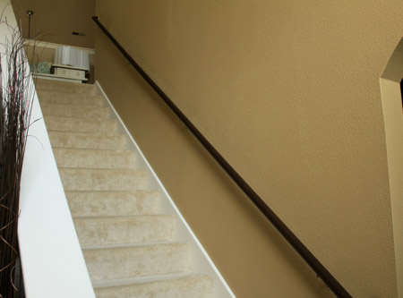 Here's an easy way to add interest to a bland staircase, using moulding and trim that you can buy at any Builders.