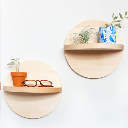 These circular wall shelves are easy to make using pine, plywood or supawood.
