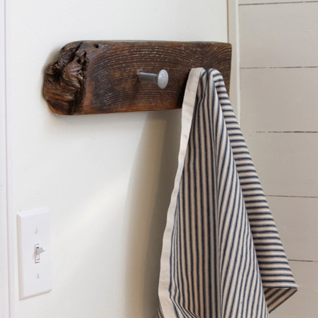 Bathroom goes coastal with driftwood hanger