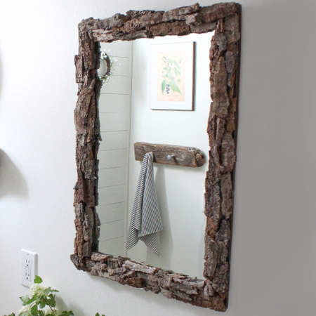 Bathroom goes coastal with driftwood mirror