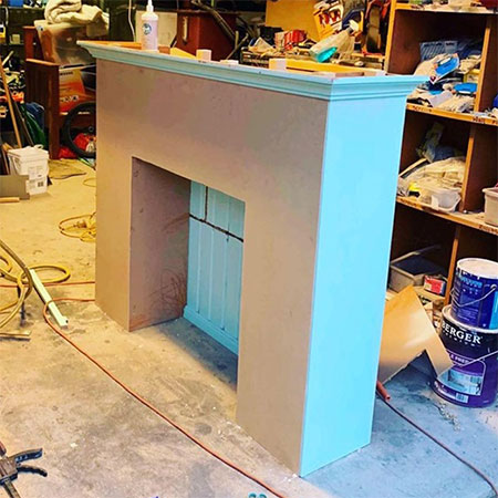 Old Hutch becomes an Amazing Fireplace Feature