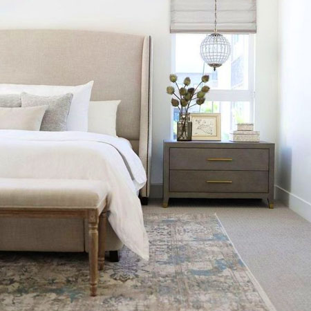 add rugs for comfort underfoot in bedroom