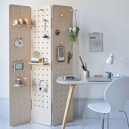 pegboard wall or room divider with shelves