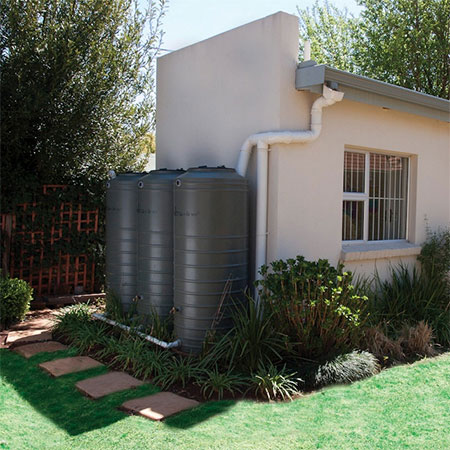 a rainwater tanks collects rain in summer for use in winter