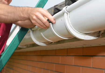 replace damaged sections on gutters and downspouts