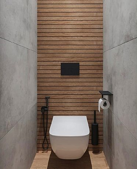 concrete and wood guest toilet