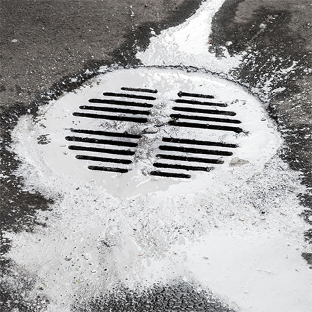 paint should never be flushed down a toilet or poured into a drain
