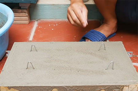 add feet to concrete planter