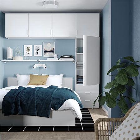Floor-to-ceiling storage cupboards for a bedroom