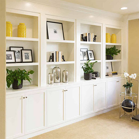 Floor-to-ceiling storage cupboards for a living or family room