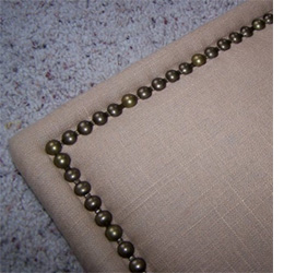 Add nailhead trim to upholstered furniture 